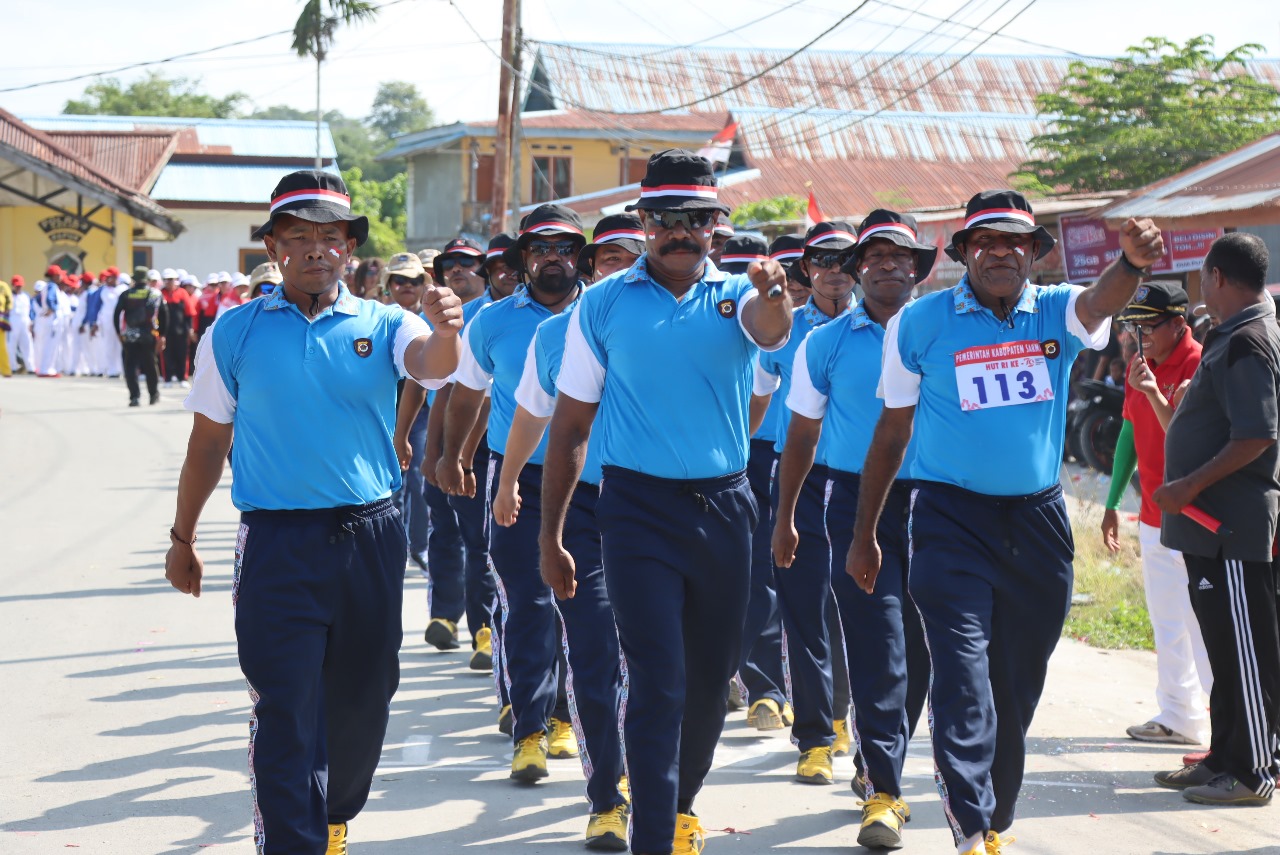 Sambut Dirgahayu Republik Indonesia ke 79 Personil Polres Sarmi Serta Bhayangkari Meramaikan Lomba Gerak Jalan