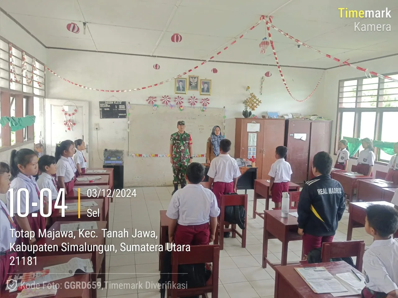 Babinsa Sosialisasi  Lagu Indonesia Raya di Sekolah SDN 094179 Totap Majawa