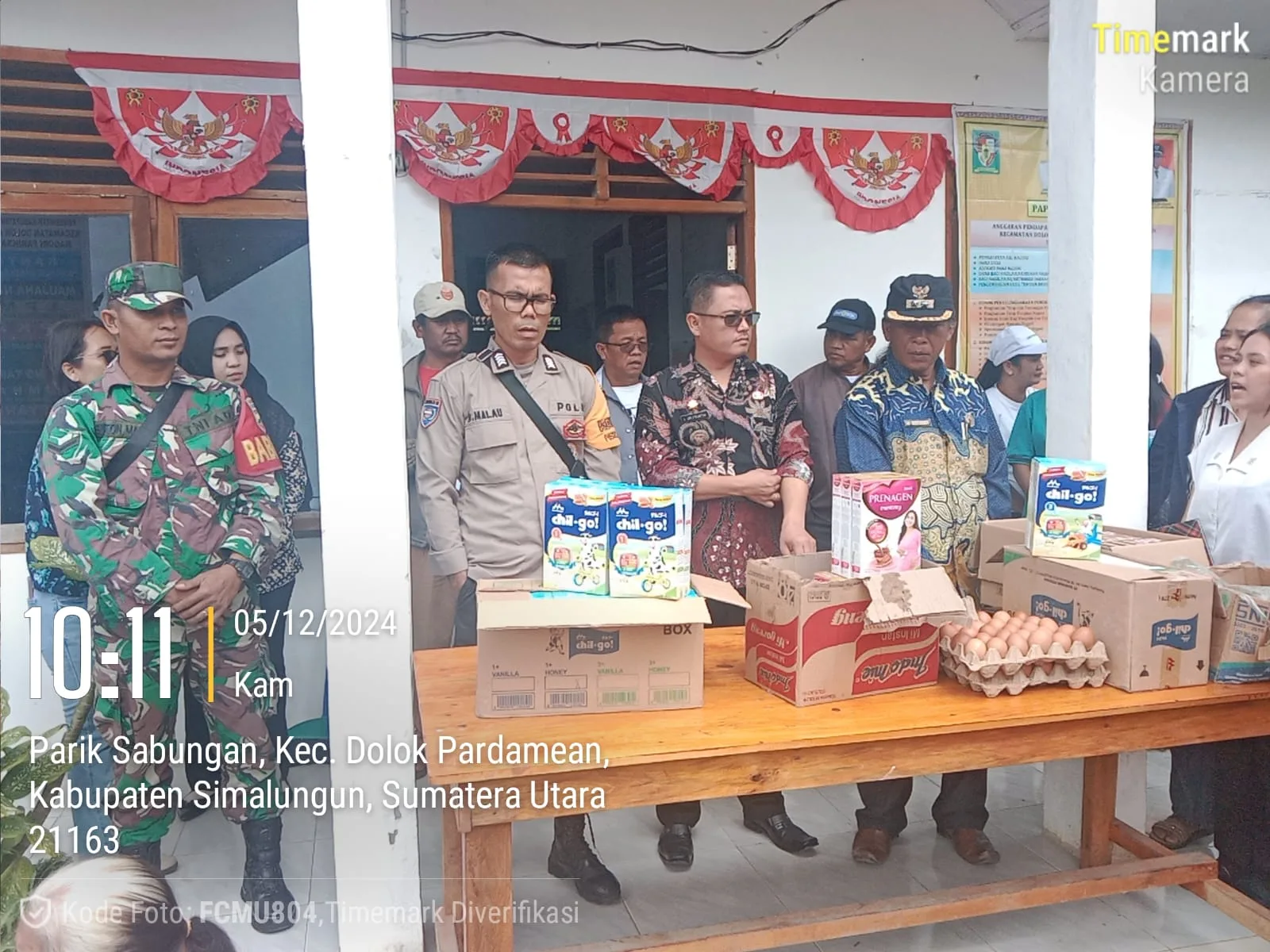 Babinsa Hadiri Pembagian BLT Lansia dan Pemberian Makanan Tambahan Balita di Nagori Parik Sabungan