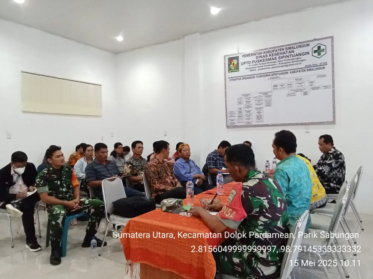 Babinsa Koramil 15/Dolok Pardamaian Hadiri Rapat Lintas Sektoral Bahas BPJS Bagi Warga Tidak Mampu di Sipintuangin