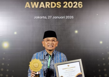 Bupati Simalungun Terima Penghargaan UHC Kategori Madya: Capaian Kepesertaan Tembus 101,67%