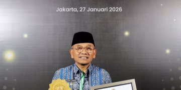 Bupati Simalungun Terima Penghargaan UHC Kategori Madya: Capaian Kepesertaan Tembus 101,67%