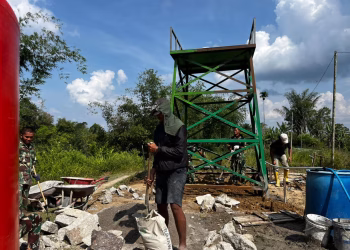 Satgas TMMD Gerak Cepat Pasang Pipa Tandon Sumur Bor, Air Bersih Segera Dinikmati Warga Nagori Limag