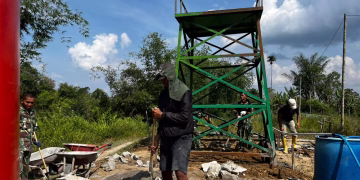 Satgas TMMD Gerak Cepat Pasang Pipa Tandon Sumur Bor, Air Bersih Segera Dinikmati Warga Nagori Limag